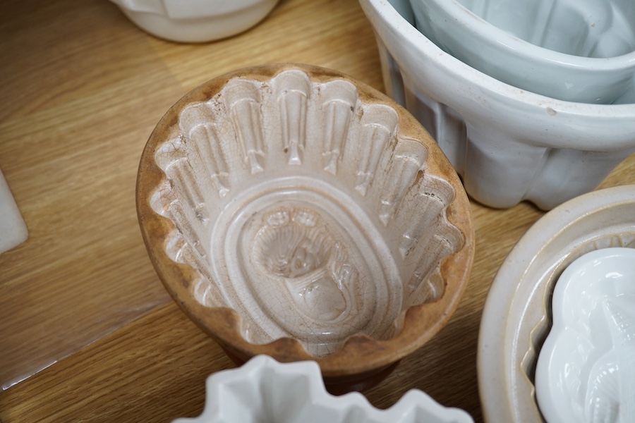 Twenty early 20th century ceramic jelly moulds, including an example by Shelley, etc. Condition - fair